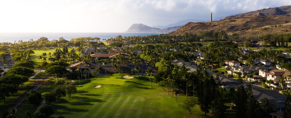 overhead view of course with coastline in the background